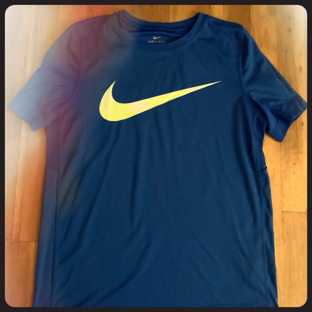 Blue Nike T shirt with yellow check mark
